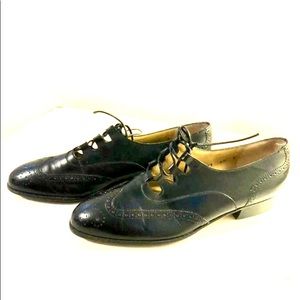 SALVATORE FERRAGAMO Lace up flats. 6.5